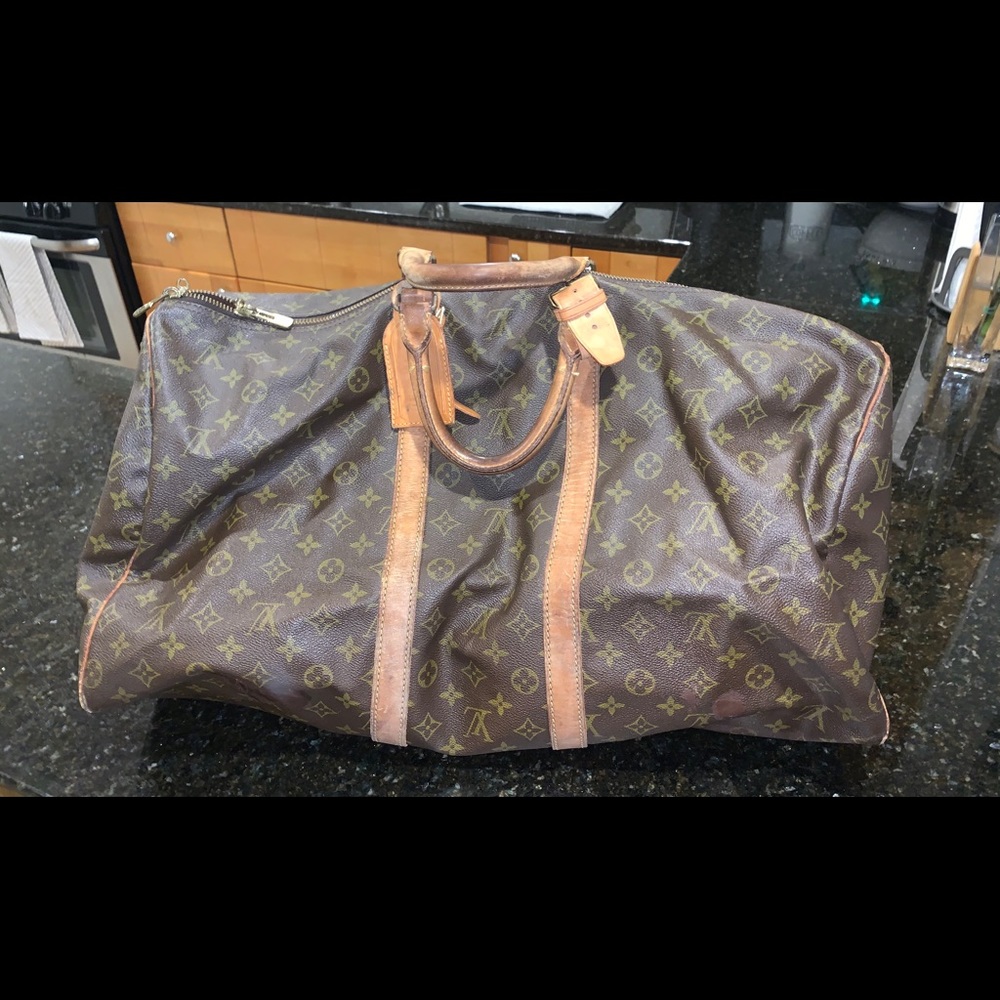 Louis Vuitton keepall 55 duffel bag (used)